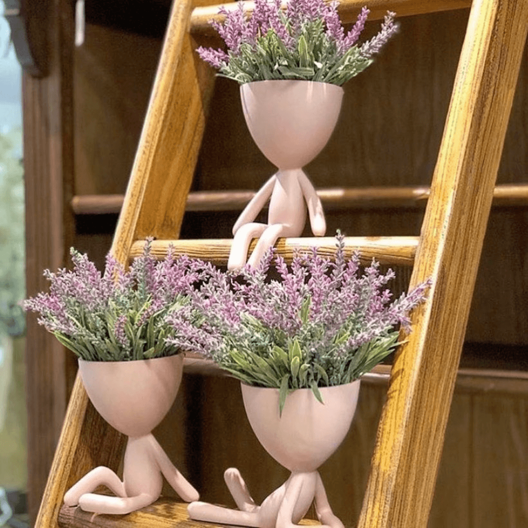 Vaso Cachepot Bob Sentado de Lado em Poliresina Rosa - 14 x 11 cm